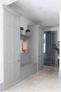 the instagram page shows an image of a room with white walls and gray doors