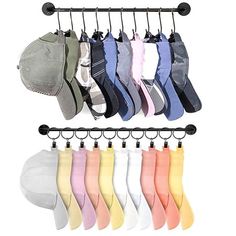 six pairs of socks hanging on a rack with hats and other items attached to it