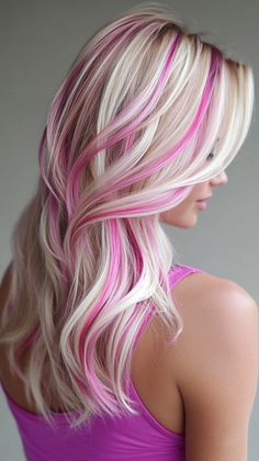 Add a vibrant touch with hot pink tips that stand out on tan skin. Visit our page for tips on achieving this bold look. Save this pin for hair tip ideas! Tags: #HotPinkTips #HairColor #TanSkin Pink Hair Spray, Hot Pink Tips, Salon Photoshoot