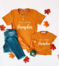 "Ohh, my - It's autumn! Our mustard color \"Hey there pumpkin\" shirts are a must-have for this season. This super soft cotton-spandex t-shirt has been manufactured and is sold ONLY by LittleMiaBella, this is NOT a Bellas Canvas t-shirt- we encourage you to look at all measurements carefully. I T E M D E S C R I P T I O N * Material: 97% Cotton 3% Spandex * Color: Mustard Yellow * Direct to garment design * Detail: Adult 5/8\" neck band. Kids Rib neck band * Unisex kids shirt * Fit type: Women F Cute Thanksgiving Shirts Mom And Me, Mom And Me Fall Shirts, Mama And Mini Thanksgiving Shirts, Pumpkin Shirt Mam And Child, Kids Pumpkin Shirt, Black Babydoll, Mommy And Me Dresses, Mommy And Me Shirt, Matching Pajamas