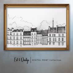 a black and white drawing of buildings on a wall in a gold frame with the words ed & daisy's digital print collection