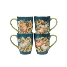 four coffee cups with pumpkins and sunflowers on them