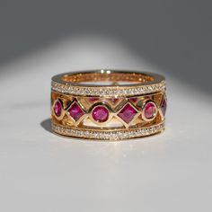 Art Deco meets classic regality. Rubies and diamonds dance around the finger. Materials - 14k Yellow Gold, Ruby, Diamond Weights - 2.51ct Ruby, 0.79ct Diamond Size - 6.5 Luxury Yellow Gold Rectangular Ruby Ring, Rubies And Diamonds, Royal Ruby, Faberge Jewelry, Ruby Jewelry, Ruby Diamond, Ruby Ring, Jewelry Business, Diamond Sizes