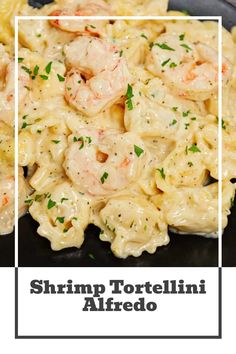 shrimp tortellini alfredo on a black plate with the words shrimp tortellini alfredo