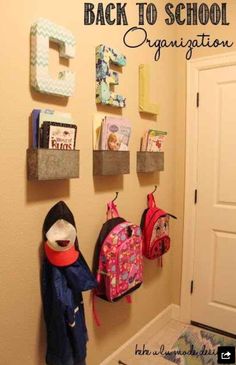 the back to school organization is hanging on the wall in this child's room