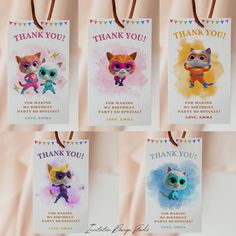 the littlest pet shop thank you tags are hanging from strings