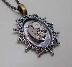 "Awesome steampunk necklace . The size is 1 1/4 \" by 1 \" and it has 24\" antique brass chain. All my jewelry come in a nice gift box." Steampunk Silver Necklace With Round Pendant, Gold Steampunk Round Pendant Jewelry, Silver Steampunk Necklace With Round Pendant, Gold Steampunk Jewelry With Round Pendant, Steampunk Locket Jewelry Collectible, Steampunk Silver Pendant Necklace, Silver Steampunk Pendant Necklace, Steampunk Metal Locket Necklace, Steampunk Brass Locket Jewelry