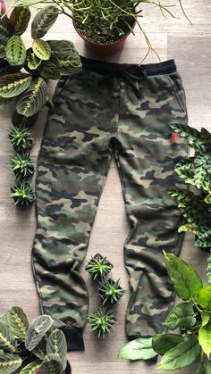 camouflage joggers adorned with red Detroit GT logo on the hip Casual Camouflage Cotton Sweatpants, Camouflage Cotton Sweatpants For Streetwear, Sporty Camouflage Bottoms For Outdoor, Sporty Camouflage Cotton Bottoms, Gt Logo, Camo Joggers, Camouflage, Camo, Gender Neutral