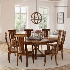 a dining room table with chairs and a chandelier