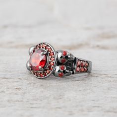 1.35tcw Red Garnet Skull Couple Rings Gothic Wedding Ring Set Red Halloween Ring, Red Gothic Jewelry For Anniversary, Gothic Red Ruby Promise Ring, Red Ring Jewelry For Halloween, Gothic Red Gemstone Jewelry, Red Gothic Gemstone Jewelry, Red Skull Ring For Anniversary, Elegant Red Skull Ring For Wedding, Red Rings For Halloween Gift