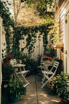 Cozy garden patio with white furniture surrounded by lush plants and flowers. Small Patio Garden Ideas, Small Patio Furniture Ideas, Small Patio Ideas On A Budget, Patio Garden Ideas, Small Patio Ideas, Clever Furniture, Patio Ideas On A Budget, Small Patios, Small Patio Furniture