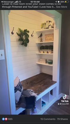 the inside of a room with shelves and other items on it, including a wooden bench