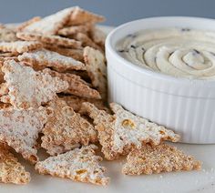 some crackers and dip on a plate