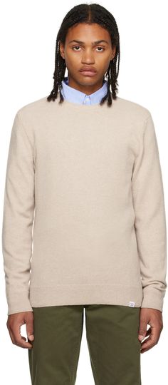 7-gauge knit merino wool sweater. · Rib knit crewneck, hem, and cuffs · Logo patch at front hem Supplier color: Oatmeal Norse Projects, Merino Wool Sweater, Knitwear Men, Wool Sweaters, Patch Logo, Apparel Accessories, Merino Wool, Rib Knit, Shirts Tops