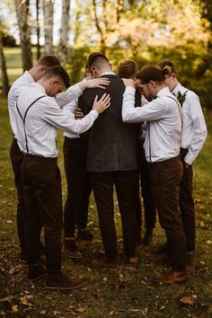 a group of men standing next to each other