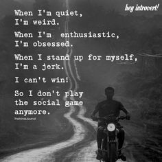 a man riding a motorcycle down a dirt road with a poem written on the side