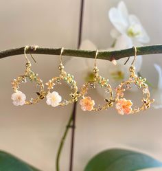 Beautiful, very classy flower Earrings, colour Gold. They have a little bee, a little flower, three gemstones and two tiny flowers on them.  You can choose them with a white flower or a rosa flower. Elegant to wear, and goes with every outfit.  The Wreath is approximately 2.2cm x 2.2cm. Choose between 18K Gold Plated HOOK and the inner layer is stainless steel or Iron HOOK. Please note the white flower one is sold out atm, will be available again in 10 days. 🎁All items will come gift-wrapped in Bumble Bee Earrings, Earrings Nature, Iron Hook, Sakura Flower, Funky Earrings, Bee Earrings, Nature Themed, Tiny Flowers, Nature Lovers