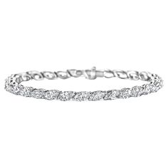 Gorgeous Tennis Diamond Bracelet With 29 Marquise Cut Diamonds Diamonds: 29 Marquise cut diamonds ,11.6 Ct Top Quality Material: 18kt White Gold Total weight: 14.1 gram / 0.500 oz / 9.1 dwt Measurements: Will maximum fit a 16 cm wrist (can be adjusted) Marquise Bracelet, Tennis Jewelry, Bracelet Diamond, Emerald Bracelet, Marquise Cut Diamond, Tennis Bracelet Diamond, Baguette Diamond, Marquise Cut, Tennis Bracelet