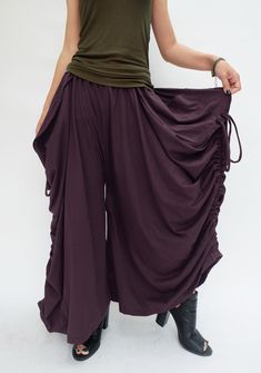 "* ALL ORDERS ARE SHIPPED VIA DHL EXPEDITED MAIL * This soft cotton jersey makes this skirt/pants a number one choice for comfort. Designed with a side hanging lower, covered elastic waistband, side pouch pockets and drawstrings run diagonally from pocket to hem-wear it smooth or ruched for a variety of sculptured effects. This 2 in 1 style can be worn as either a skirt or a pants. An awesome skirt/pants with a trick --Drawstrings which snap onto the hem to create different lengths and to create Harem Pants Outfit, Convertible Skirt, Steampunk Pirate, Dope Clothes, Convertible Pants, Peasant Skirt, Long Maxi Skirt, Pocket Skirt, Cotton Linen Dresses