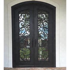 GID iron hand crafted double entry door with impressive scrollwork Front Door Security, Apartment Doors, Double Doors Exterior, Iron Front Door, Iron Entry Doors, Elegant Entryway, Door Sweep, Home Insulation, Double Front Doors