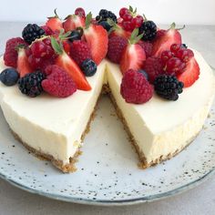 there is a cheesecake with berries on top