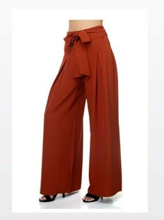 New Haute Monde Pleated Front Tie Palazzo Pants- Brick- Size Small - Womens. Condition is New with tags. Shipped with USPS First Class. **All measurements were taken laying flat on the floor** Measurements: 43 in. Front lenght. 32 in. Inseam. 14 1/2 in. High waist width. 13 in. from high waist to crotch. The fabric on these pants is high quality. They are flowy and lightweight. These pants are great for a party. The belt is not removable. It is a self tie belt. 🌟AVAILABLE IN SIZES MEDIUM AND LA Trendy High-waisted Pants With Tie Waist, Versatile High Waist Belted Bottoms, Versatile Belted Trousers, Paperbag Waist Bottoms With Belt Loops For Night Out, Fall Paperbag Waist Belted Pants, Trendy High-waisted Bottoms With Tie Waist, Trendy Tie Waist Pants For Fall, High Waist Belted Versatile Pants, Versatile High Waist Belted Pants