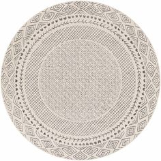 three round rugs with an intricate design on the bottom and sides, all in white