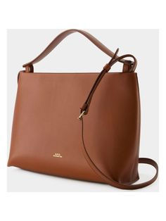 Meet the Ashley Crossbody - the perfect accessory for both your casual and dressy outfits. This versatile bag is the ideal blend of fashion and function, keeping your essentials organized and easily accessible on the go. Dimensions: Width: 27.5cm, Height: 20.5cm, Depth: 9.5cm Brown Satchel With Round Handle For On-the-go, Classic Hobo Bag With Detachable Strap For Shopping, Classic Bag With Adjustable Strap And Round Handle, Everyday Shoulder Bag With Detachable Strap And Round Handle, Versatile Travel Bag With Round Handle, Versatile Brown Bag With Round Handle, Versatile Everyday Bag With Round Handle, Chic Brown Bag With Round Handle, Brown Bag With Round Handle For On-the-go