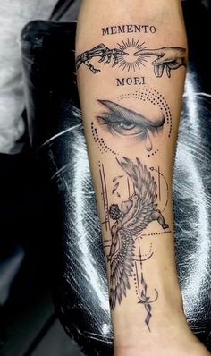 a woman's leg with tattoos on it and the words mementoo, mori