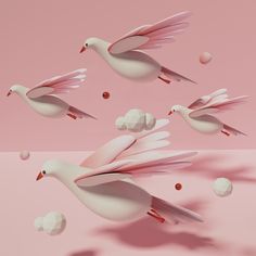 three white birds flying in the air with bubbles floating around them on a pink background