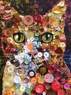 a cat made out of buttons and other things