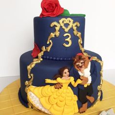 a beauty and the beast cake with roses on top