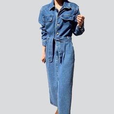 Casual Belted Denim Jacket, Spring Belted Denim Jumpsuit, Belted Denim Jumpsuit For Spring, Spring Denim Jumpsuit With Belt, Trendy Belted Denim Dress, Belted Denim Dress For Fall, Vintage Long Sleeve Denim Jumpsuit For Spring, Maxi Denim Dress, Long Denim Dress