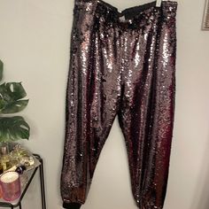 Perfect For All Your Holiday Parties! Fully Lined. Waist: 17” Lying Flat Does Stretch To 22” Inseam: 28.5” Sequin Color Seems To Me To Be A Purplish Pewter Glamorous Fitted Purple Bottoms, Fitted Purple Bottoms For Party Season, Glamorous Purple Bottoms For Night Out, Purple Pants For Night Out In Fall, Purple Disco Bottoms, Stretch Purple Bottoms For Costume Party, Ann Taylor Loft, Holiday Parties, Track Pants