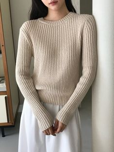 Superb 100% cotton fabric in this high rounded neckline long sleeve knit. Fitted silhouette and comfortable style. Model is in MINUSEY ONE SIZE. ✔️ Free worldwide express shipping over $100✔️ Loved by 6,500+ customers✔️ Limited edition collections, maximum style⠀⠀⠀⠀⠀⠀⠀⠀⠀Stay ahead of the trend with can’t-find-anywhere-else staples. Your closet will thank you 💕* MINUSEY ONE SIZE = EU 34-38, US 2-6* 100% Cotton* Dry clean* Made in Korea - Model Height: 172cm/5'7" (US2, EU34) Basic Winter Sweater, Beige Stretch Crew Neck Sweater, Cream Ribbed Crew Neck Sweater, Basic Sweater With Ribbed Neckline For Fall, Basic Fall Sweater With Ribbed Neckline, Beige Fine Knit Long Sleeve Sweater, Beige Long Sleeve Fine Knit Sweater, Cream Long Sleeve Sweater With Ribbed Neckline, Basic Long Sleeve Sweater