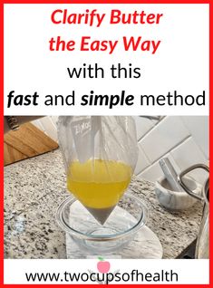 a glass bowl filled with yellow liquid on top of a counter next to a red and white sign that says clarify butter the easy way