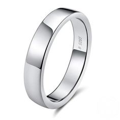 a white gold wedding ring on a white background with the word,'love is in the