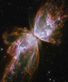 a butterfly shaped object in the sky with words below it that read,'butterfly nebula this celestial object looks like a delicate butterfly but is far from