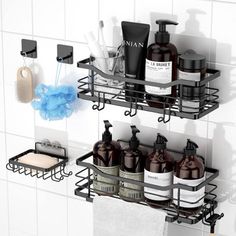 two metal shelves with soaps, lotion and other bathroom items on them in a white tiled bathroom