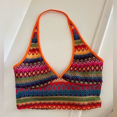 Shein Cropped Halter Top Orange Multi Colored. Never Worn. Fitted Multicolor V-neck Halter Top, Casual Multicolor Cropped Halter Top, Multicolor Triangle Halter Top For Spring, Colorful Fitted Beach Top, Trendy Multicolor Triangle Halter Top, Fitted Colorful Beach Top, Fitted Colorful Patterned Top For Beach, Multicolor Triangle Crop Top For Vacation, Multicolor Halter Neck Crop Top For Beach