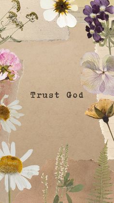 the words trust god are surrounded by wildflowers and daisies on a brown background