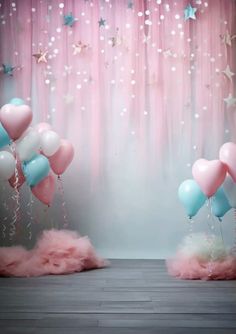 pink and blue balloons are in front of a curtain with stars on it, while fluffy clouds