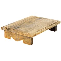 an old wooden table that has been turned into a coffee table with one end missing