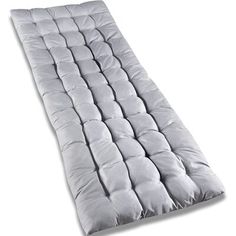 an image of a mattress that is in the air