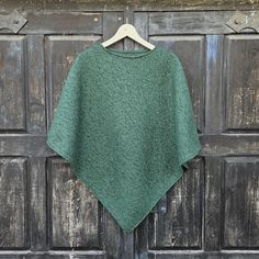 Wool blanket poncho  - cape  with fringes One size fits all  -  men or women.  Available with hood or without hood 100% wool CARE: Hand-wash and hang to dry, light iron if needed, or dry clean. MEASURES:  Available in two sizes: SHORTER Length at the front of the neckline to the bottom is ~87 cm/34 inches, the shoulder length is ~54cm/21 inches, LONGER Length at the front of the neckline to the bottom is ~115 cm/45 inches, the shoulder length is ~80cm/31 inches, Model in pictures is 170cm high a Wool Cape Coat, Blanket Poncho, Hooded Cape, Wool Cape, Cape Coat, Poncho Cape, Wool Blanket, Shoulder Length, One Size Fits All