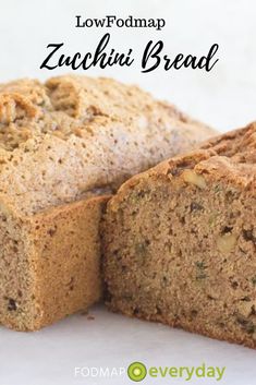 a close up of sliced bread on a white surface with the words low fodmap and gluten - free zucchini bread