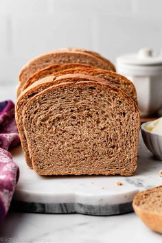 slices of whole wheat bread on a marble board