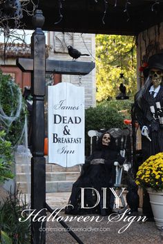 an outdoor halloween decoration with skeletons and pumpkins