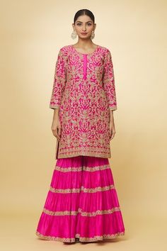 Rani pink chanderi kurta with zari and sequins hand embroidery. Comes with sharara and a dupatta. - Aza Fashions Pink Palazzo Set With Dori Work For Navratri, Pink Sharara With Cutdana For Festive Occasions, Festive Pink Sharara With Cutdana Details, Festive Pink Sharara With Cutdana, Diwali Pink Palazzo Set With Dori Work, Pink Palazzo Set With Zari Work For Diwali, Designer Pink Sharara With Dori Work, Pink Sharara With Gota Work For Navratri, Navratri Pink Sharara With Gota Work