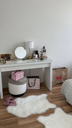 a white table with various items on it and a bag in front of the table